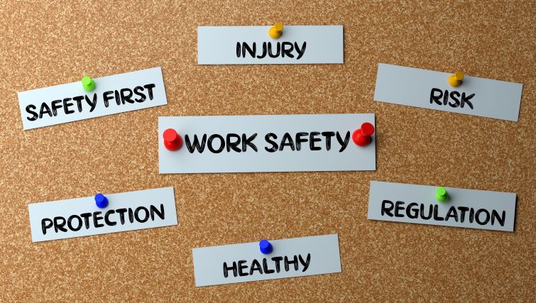 How HR Can Help Improve and Maintain Workplace Safety - a bulletin board with workplace safety written on it.